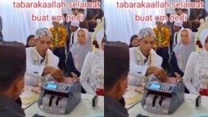 VIRAL-Pengantin-Pria-Hitung-Duit-Mahar-Pakai-Mesin-Penghitung-Uang-di-Meja-Akad-Netizen-Heran.jpg