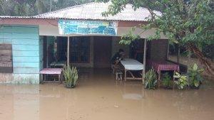banjir-merendam-Desa-Juhar.jpg
