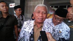 bupati_asahan_surya_hari_guru.jpg