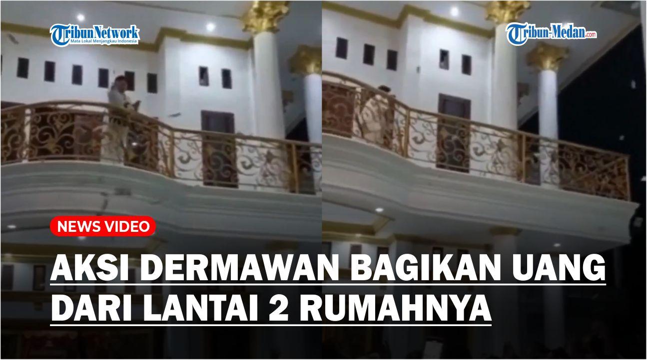 Aksi-Orang-Dermawan-Bagi-Bagikan-Uang-dari-Lantai-Dua-Rumahnya.jpg