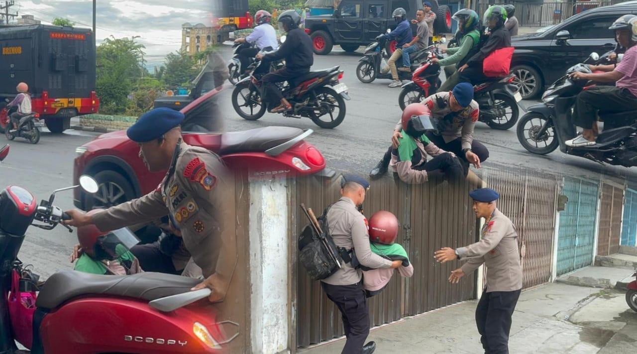 Danst-Brimob-Beri-pertolongan-kepada-pengendara-yang-mengalami-kecelakaan.jpg