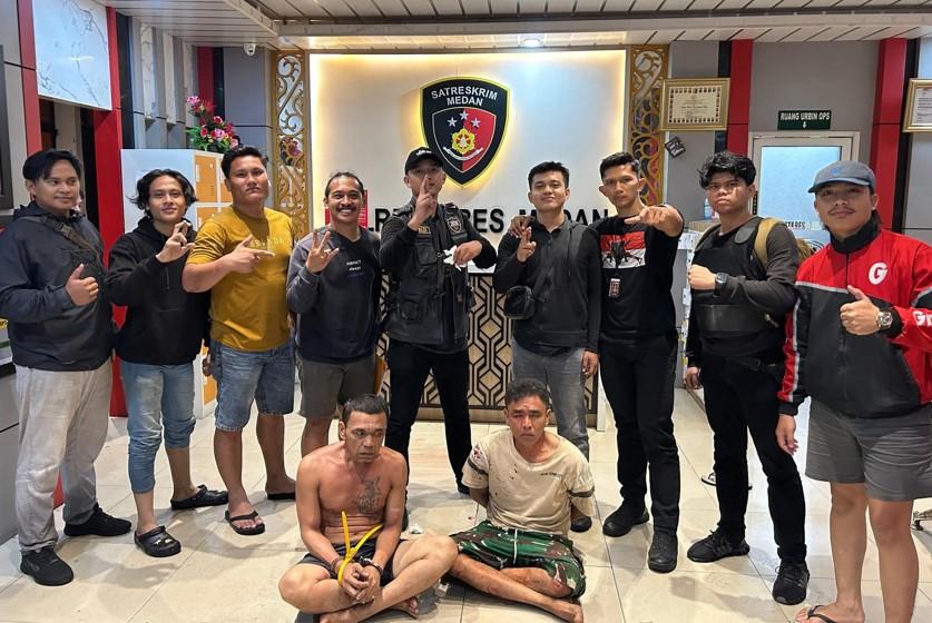 Dua-pelaku-penganiayaan-Pasutri-diamankan-di-Satreskrim-Polrestabes-Medan11.jpg