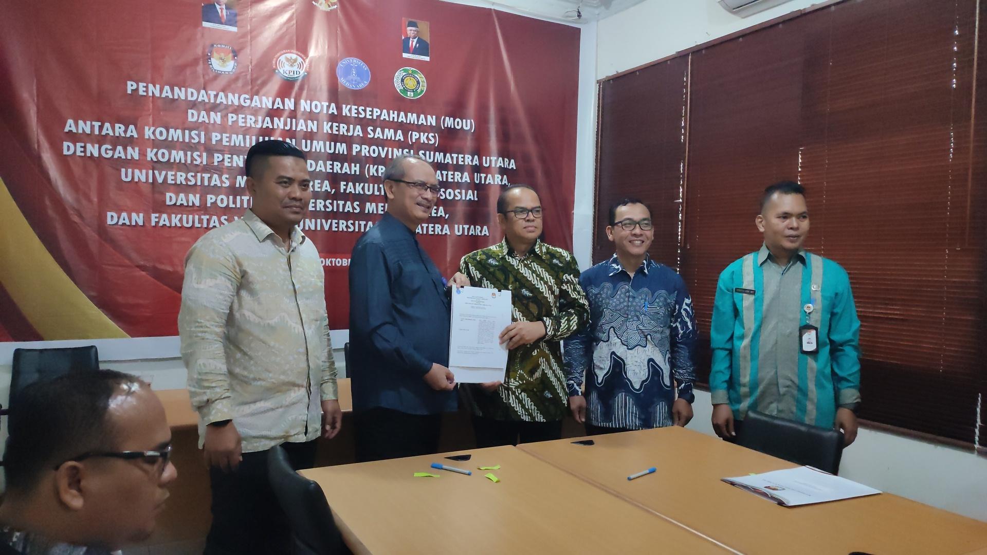 Komisi-Pemilihan-Umum-KPU-Sumatera-Utara-menandatangani-nota-kesepahaman.jpg