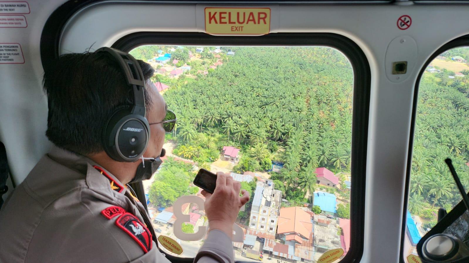 Panca-pantau-arus-balik-dari-atas-heli-tribun.jpg