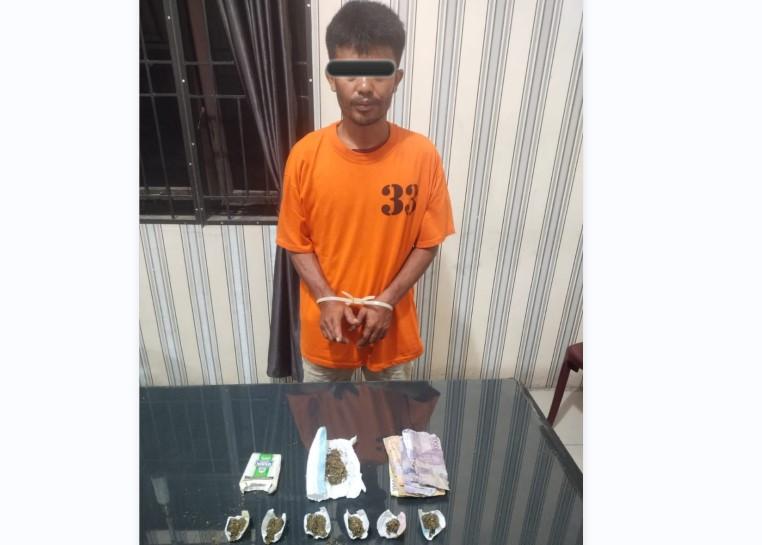 Pelaku-bersama-barang-bukti-narkotika-jenis-ganja-diamankan-di-Mapolres-Tanah-Karo.jpg