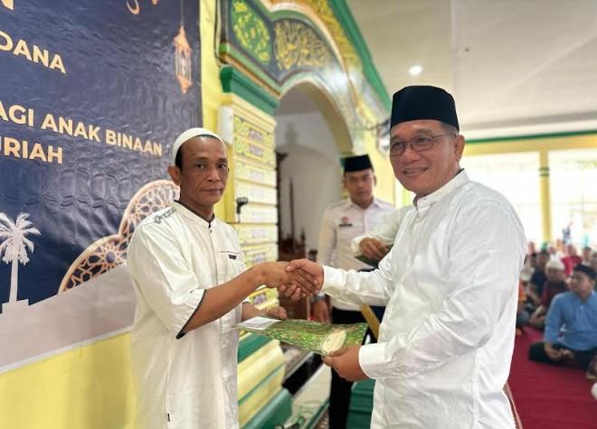 Penyerahan-remisi-khusus-Idul-Fitri-kepada-849-Warga-Binaan-Pemasyarakatan.jpg