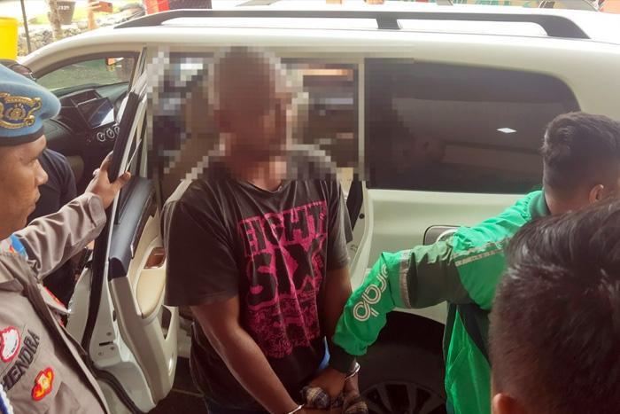 Potret-polisi-berjaket-ojol-menangkap-tersangka-pembunuhan-di-Medan.jpg