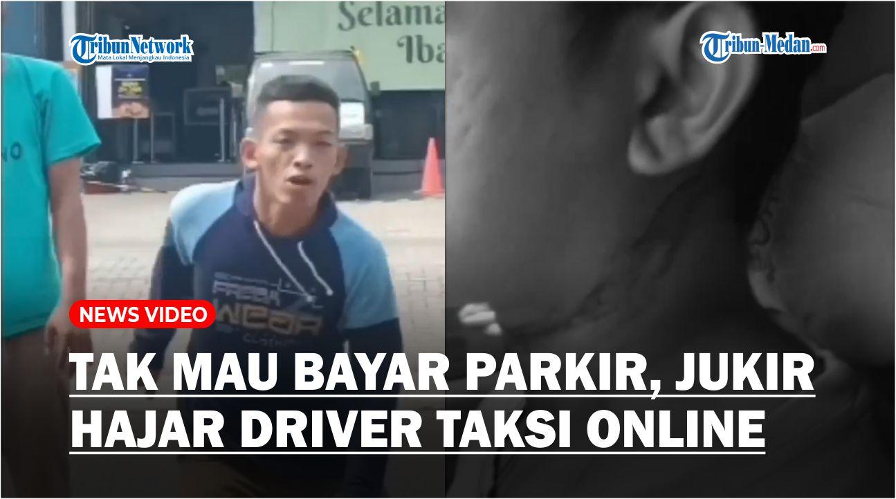 Tak-Mau-Bayar-Parkir-saat-Turunkan-Penumpang-Tukang-Parkir-Ini-Hajar-Driver-Taksi-Online.jpg