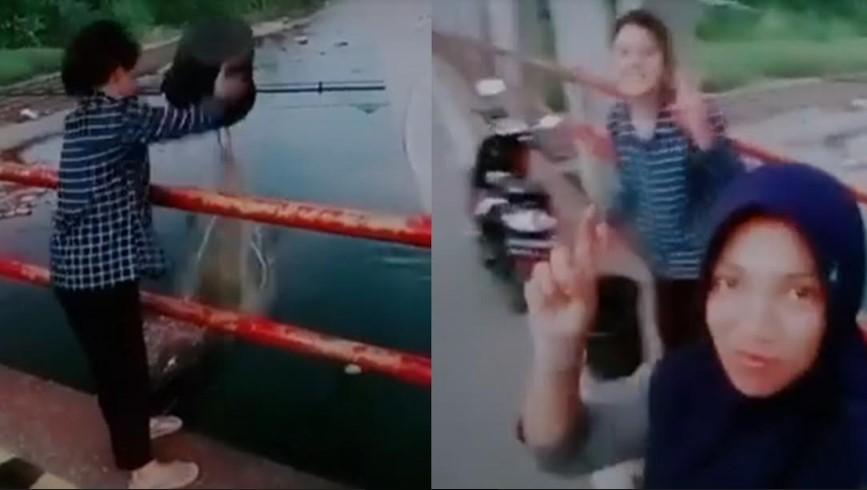 Video-dua-wanita-buang-sampah-ke-sungai-dan-berjoget-ria_Viral-Medsos_.jpg