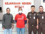 AKBP-Achirudin-Hasibuan-Baju-tahanan-setelah-ditangkap-Kejaksaan-Negeri-Medan.jpg