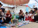 AKBP-Wahyudi-Rahman-bagi-roti-jkfg.jpg