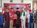 Adhan-Nur-didampingi-kerabat-dan-para-pendukungnya-mendatangi-DPC-PDIP-Langkat.jpg