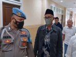 Ahmad-Nasrullah-tengahpakai-peci-ditetapkan-sebagai-tersangka.jpg