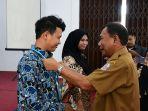 Ashari-Tambunan-Petugas-Verifikator.jpg