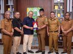 Bupati-Madina-teken-MoU-dengan-BPJS.jpg