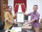 Bupati-Sergai-Darma-Wijaya-saat-menjamu-perwakilan-Ketua.jpg