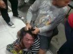 Foto-Pria-yang-Sedang-di-Amankan-Warga-Saat-Ketahuan-Mencuri-di-Minimarket.jpg
