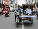 Gubernur-Jawa-Tengah-Ganjar-Pranowo-langsung-naik-becak-bermotor.jpg