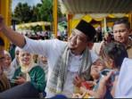 Gubernur-Sumatera-Utara-Bobby-Nasution-saat-berkampanye-di-Tapanuli-Selatan_27102025.jpg