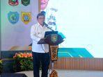 HM-Ali-Yusuf-Siregar-ketika-menyam.jpg
