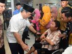 HM-Ali-Yusuf-Siregar-menyerahde.jpg