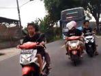 KECELAKAAN-MAUT-Sejumlah-bocah-berburu-klakson-telolet-bus-di-Jalan-Raya.jpg