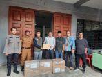 KPUD-Karo-menerima-pasokan-logistik-berupa-segel-di-Gudang.jpg