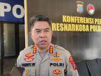 Kabid-Humas-Polda-Sumut-Kombes-Ferry-Walintukan-saat-diwawancarai-mengenai-persiapan.jpg