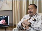 Kamaruddin-ungkap-sosok-perempuan-berbaju-cokelat.jpg