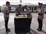 Kapolres-Dairi-AKBP-Agus-Bahari-memimpin-apel-serah-terima-jabatan-Kapolsek-Sumbul_1.jpg