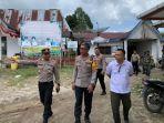 Kapolres-Dairi-AKBP-Agus-Bahari-saat-melakukan-pengecekan-di-PPK-Kecamatan-Parbuluan.jpg
