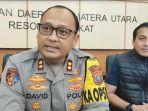 Kapolres-Langkat-AKBP-David-Triyo-Prasojo-didampingi-Kasat-Reskrim-AKP-Dedi-Mirz_1.jpg