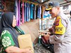 Kapolres-PSP-Serahkan-Bantuan-ke-warga-Lemah.jpg