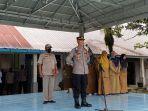 Kapolsek-Air-Joman-Iptu-T-Lawolo-upacara-di-sma-negeri-1-air-joman-tribun.jpg