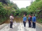 Kondisi-jalan-lintas-di-Desa-Lau-Kidupen-yang-sempat-tertutup-longsor_.jpg