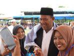 Langkat-HSyah-Afandin-SH-menghadi.jpg