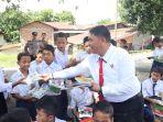Literasi-polres-batubara-di-posko-kampung-bebas-narkoba-m232.jpg