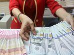 Nilai-tukar-rupiah-terhadap-dolar-Amerika-Serikat-semakin-lemahsss.jpg