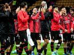 Para-pemain-AC-Milan-melakukan-selebrasi-di-penghujung-pertandingan.jpg