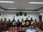 Pemkab-Karo-Tandatangan-NPHD-Pilkada-2024.jpg