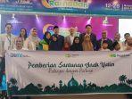 Penyaluran-bantuan-kepada-1000-anak-yatim.jpg
