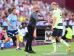 Pep-guardiola-da-haaland.jpg