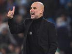 Pep-guardiola-jas-hitam.jpg