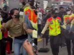 Petugas-Kereta-Rel-Listrik-KRL-menggotong-paksa-seorang-wanita-di-Stasiun-Tanah-Abang1.jpg