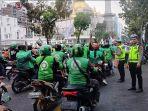Petugas-kepolisian-mengatur-arus-lalulintas-di-Jalan-Pangeran-Diponegoro.jpg