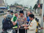 Polres-Dairi-bersama-sektor-lintas-agama-menggelar-berbagi-makanan-berbuka-puasa.jpg