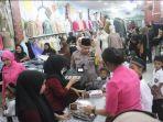 Polres-Langkat-bersama-puluhan-anak-yatim-berbelanja-pakaian-baru.jpg