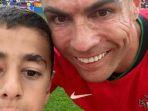 Ronaldo-selfie-dengan-bocah.jpg