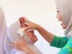 medan/SOSOK-Hani-Puji-Astuti-Guru-yang-Viral-Karena-Hapus-Makeup-Siswi-Tindakannya-Banjir-Pujian.jpg