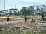 Sejumlah-pekerja-sedang-melakukan-pengerjaan.jpg
